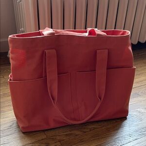 Dagne Dover Coral Canvas Tote Bag